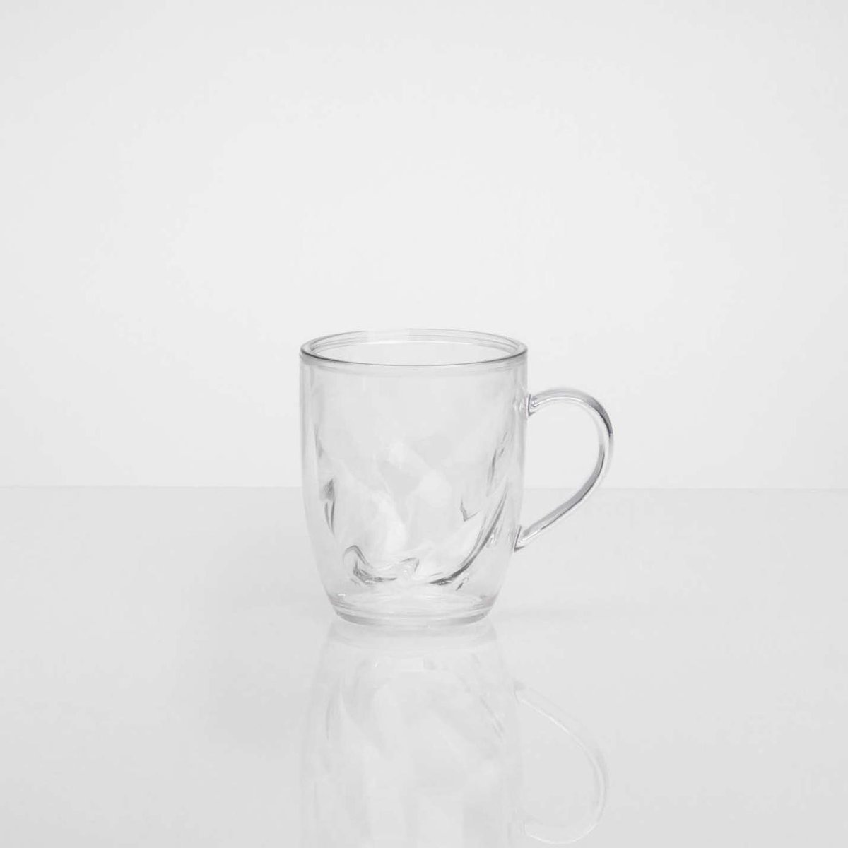 Clear textured glass mug with handle