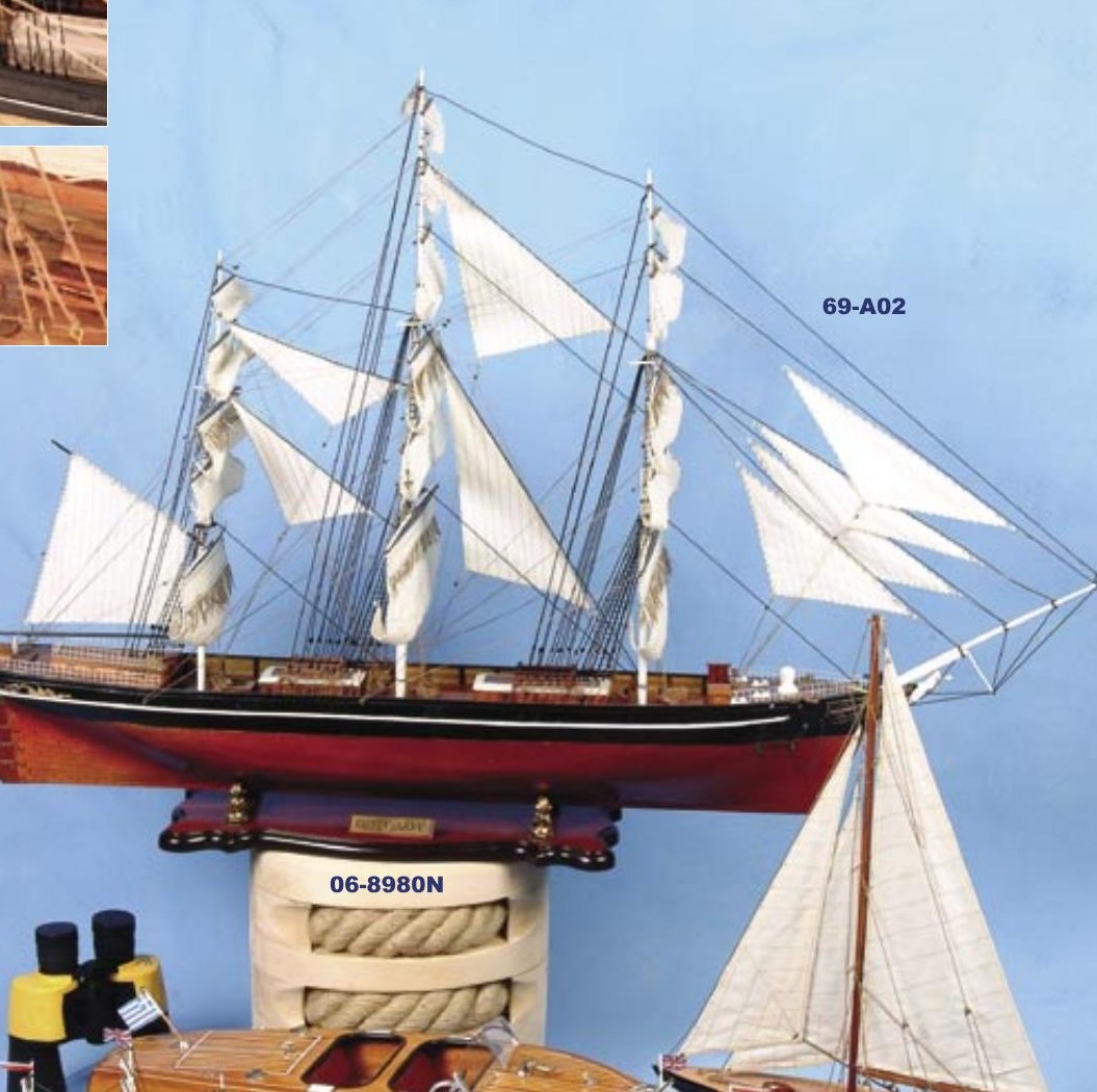 Cutty Sark ship model with white sails and dark wooden hull in an older Marine Look catalogue